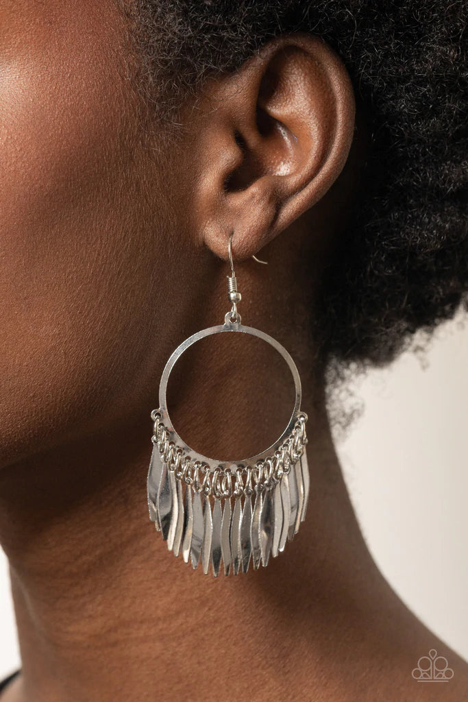 Paparazzi Accessories Radiant Chimes - Silver Flared flat bars stream out from the bottom of a glistening silver hoop, creating a radiant fringe. Earring attaches to a standard fishhook fitting. Sold as one pair of earrings. Jewelry