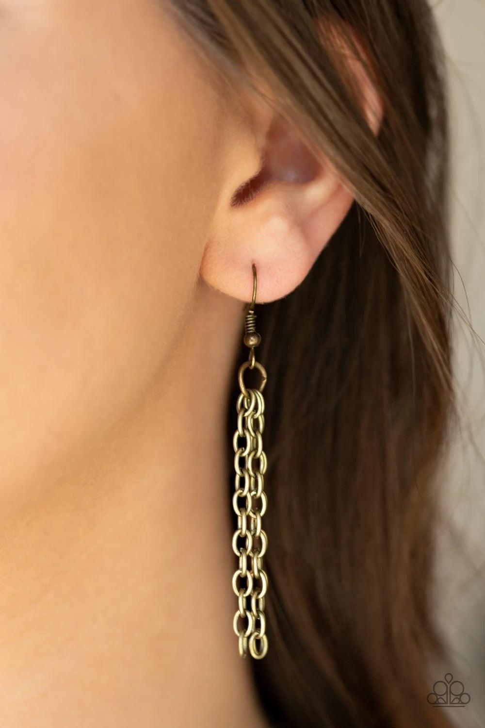 Paparazzi Accessories Breaking Pattern - Brass Hammered in an array of mismatched textures, three asymmetrical hoops join into an abstract pendant at the bottom of a lengthened brass chain for a handcrafted look. Features an adjustable clasp closure. Sold