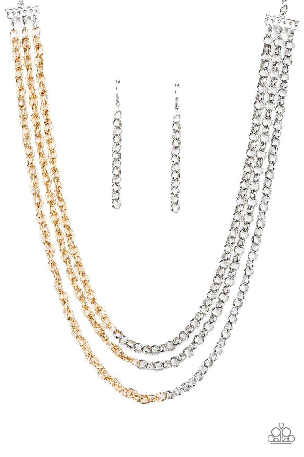 Paparazzi Accessories Metro Madness - Silver Strung between two silver fittings, glistening silver chains collide with shimmery gold chains below the collar, creating edgy mixed metallic layers. Features an adjustable clasp closure. Sold as one individual