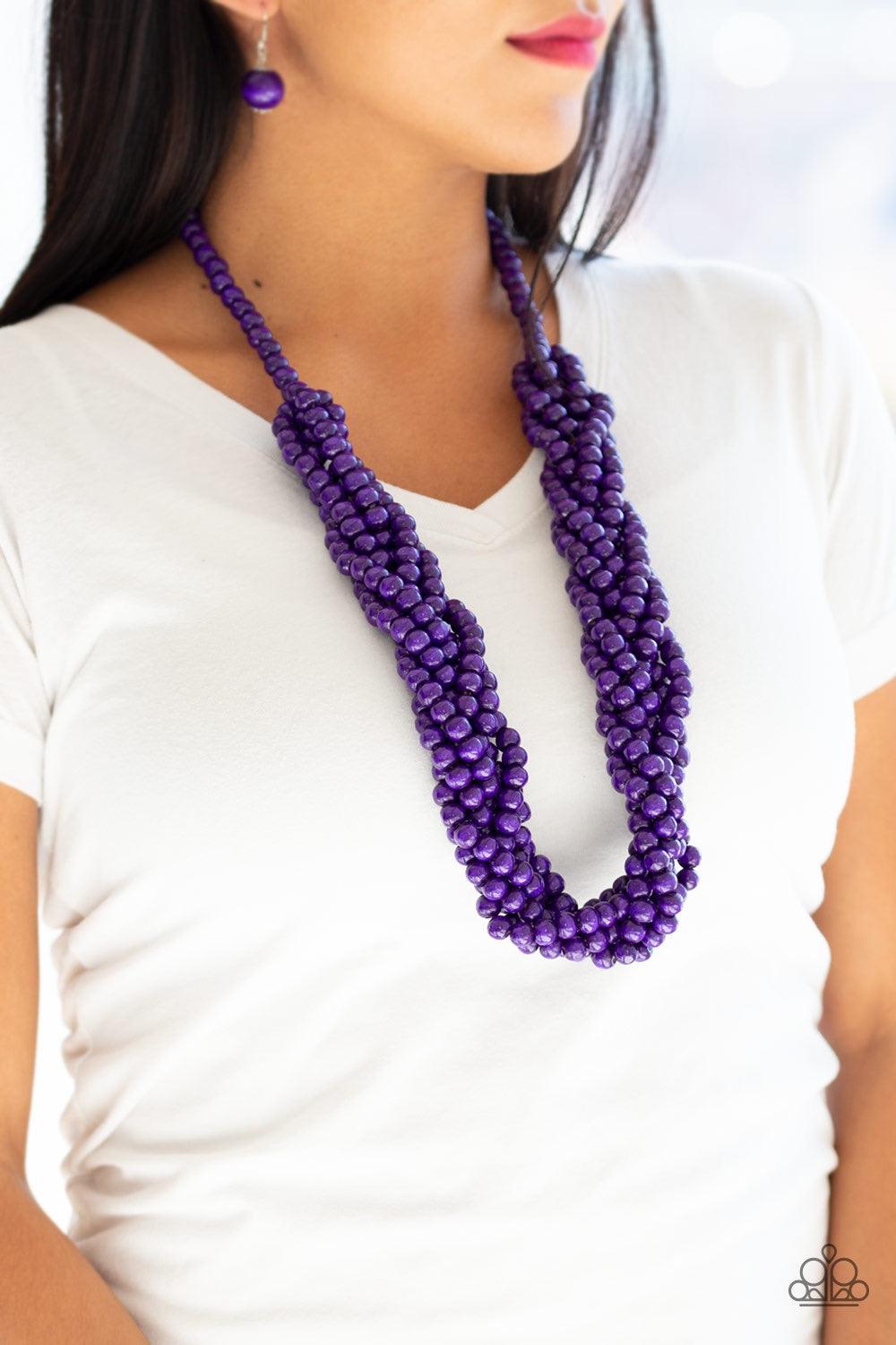 Paparazzi Accessories Tahiti Tropic - Purple Brushed in a flirty purple finish, strands of vivacious wooden beads subtly twist across the chest for a summery look. Jewelry