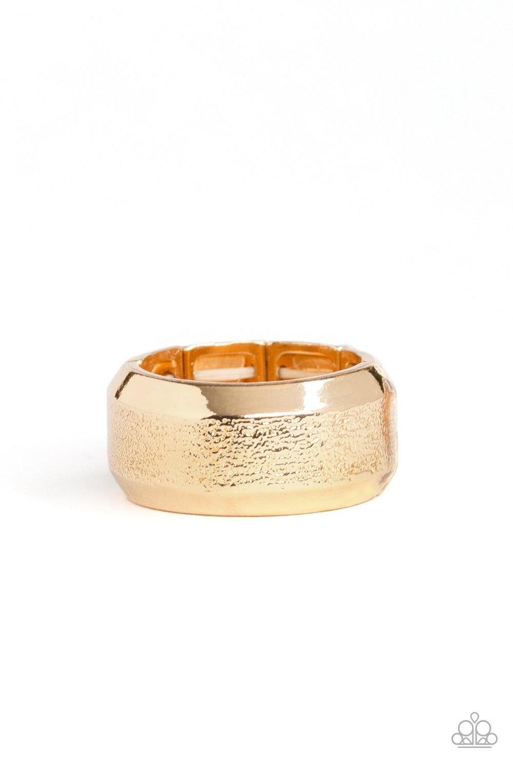 Paparazzi Accessories Checkmate - Gold The center of a beveled gold band has been delicately hammered in shimmery detail for a metro inspired look. Features a stretchy band for a flexible fit. Jewelry
