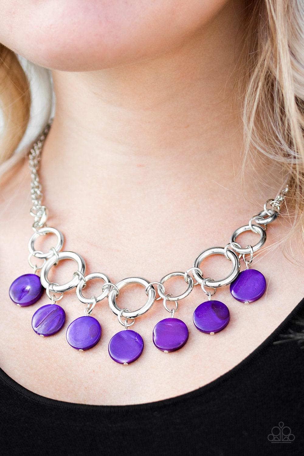 Paparazzi Accessories Coastal Adventure - Purple Brushed in a shell-like iridescence, shiny purple beading swings from the bottom of bold silver hoops, creating a colorful fringe below the collar. Features an adjustable clasp closure. Jewelry