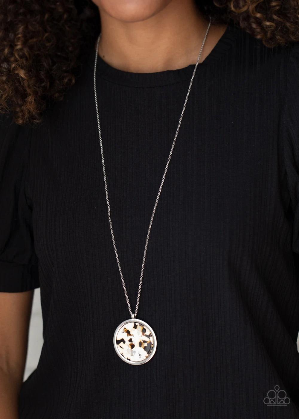 Paparazzi Accessories It’s POP Secret - Brown Featuring a brown and white tortoise shell pattern, a flat acrylic circle is pressed into a sleek silver ring, creating a colorfully retro pendant at the bottom of a lengthened silver chain. Features an adjust