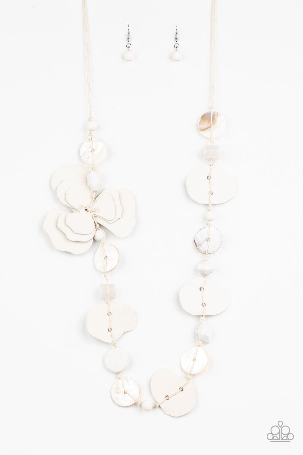Paparazzi Accessories On Island Time - White A colorful compilation of shell-like discs, mismatched white acrylic beads, and petal-like white leather pieces knot along strands of white cording across the chest. The ruffled pieces of leather stack into a w