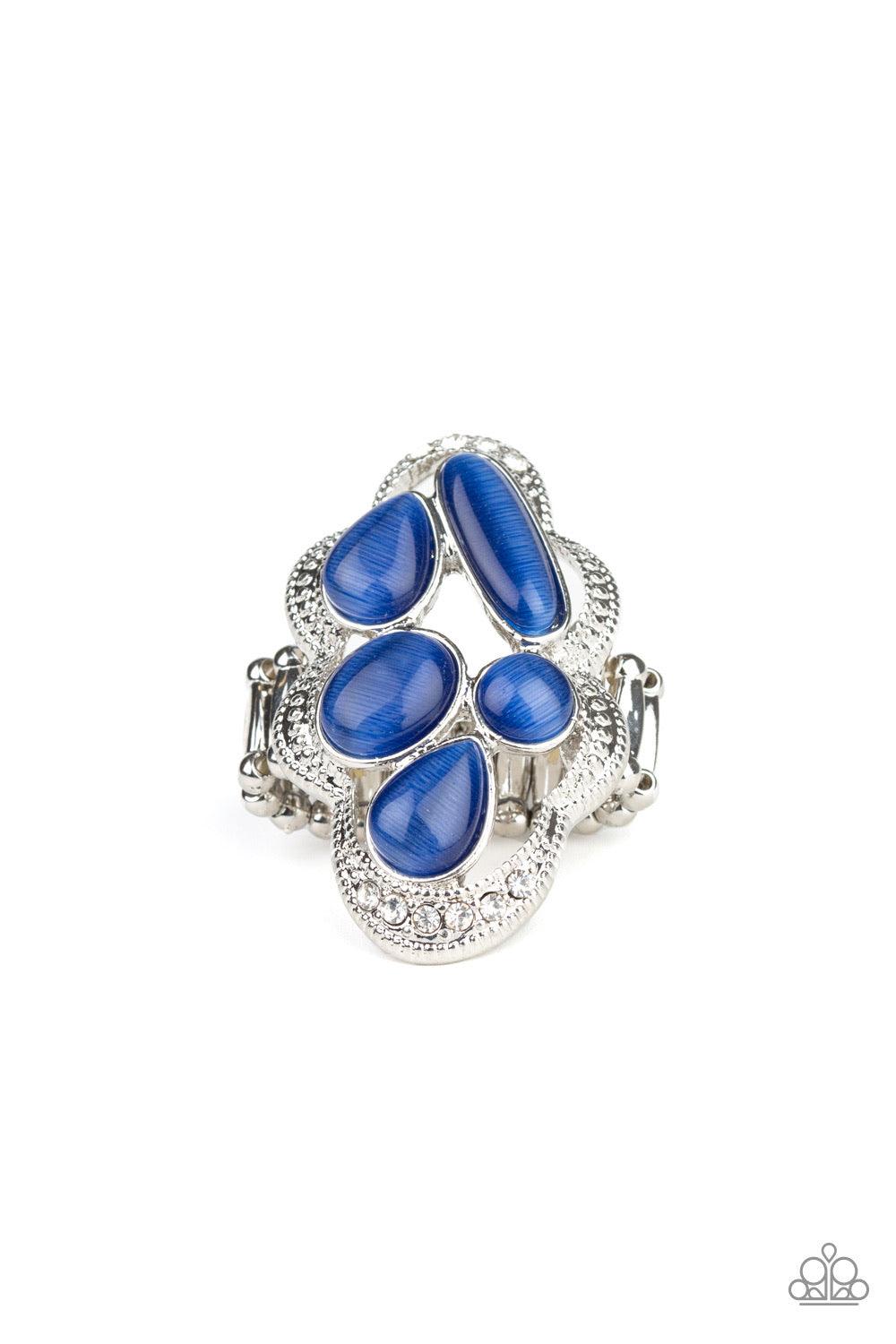 Paparazzi Accessories Cherished Collection - Blue Dotted in sections of dainty white rhinestones, a studded silver ribbon waves around a collection of blue cat's eye stones for a refined flair. Features a stretchy band for a flexible fit. Sold as one indi