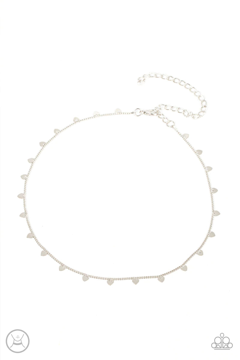 Paparazzi Accessories Cupid’s Cutest Valentine - Silver Dainty silver hearts dance from a dainty silver chain around the neck, creating a flirtatious fringe. Features an adjustable clasp closure. Sold as one individual choker necklace. Includes one pair o
