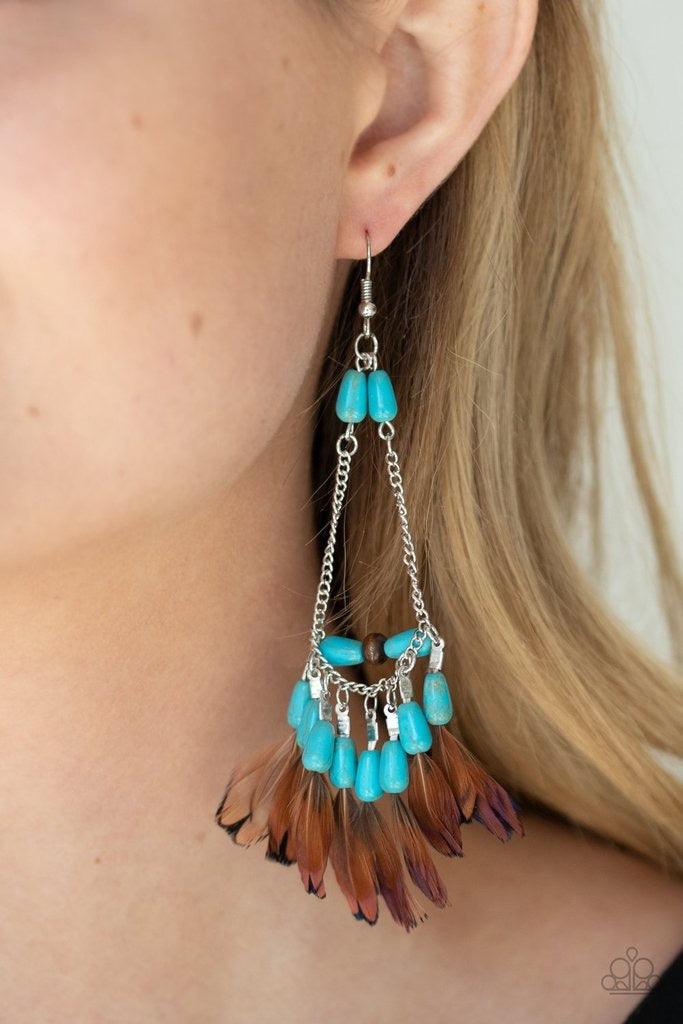 Paparazzi Accessories Haute Hawk - Blue Infused with a wooden accent, an earthy assortment of teardrop turquoise stone beads and dainty brown feathers create a free-spirited fringe at the bottom of a shimmery silver chain teardrop for a wildly wonderful f