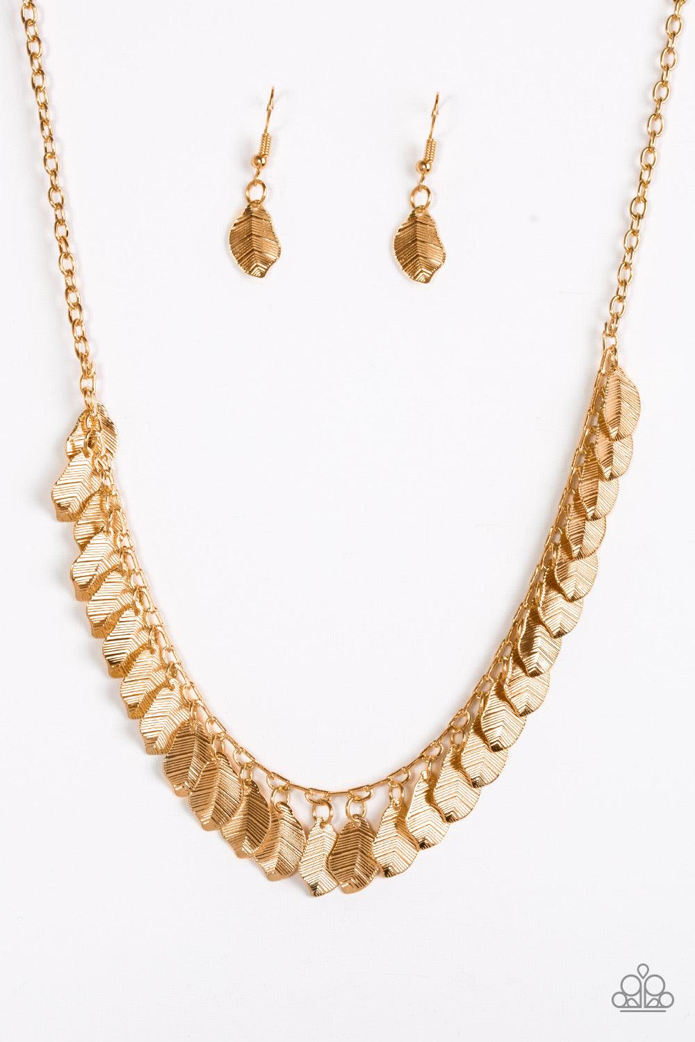 Paparazzi Accessories Sail Across The Sky - Gold Delicately etched in lifelike patterns, dainty gold feathers drip from the bottom of a glistening gold chain, creating a shimmery fringe below the collar. Features an adjustable clasp closure. Sold as one i