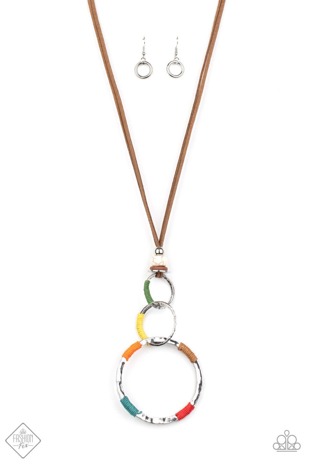 Paparazzi Accessories Rural Renovation - Multi Wrapped in sections of multicolored threaded accents, a mismatched trio of hammered silver rings link at the bottom of a beaded fitting. The earthy compilation is attached to lengthened strands of brown suede