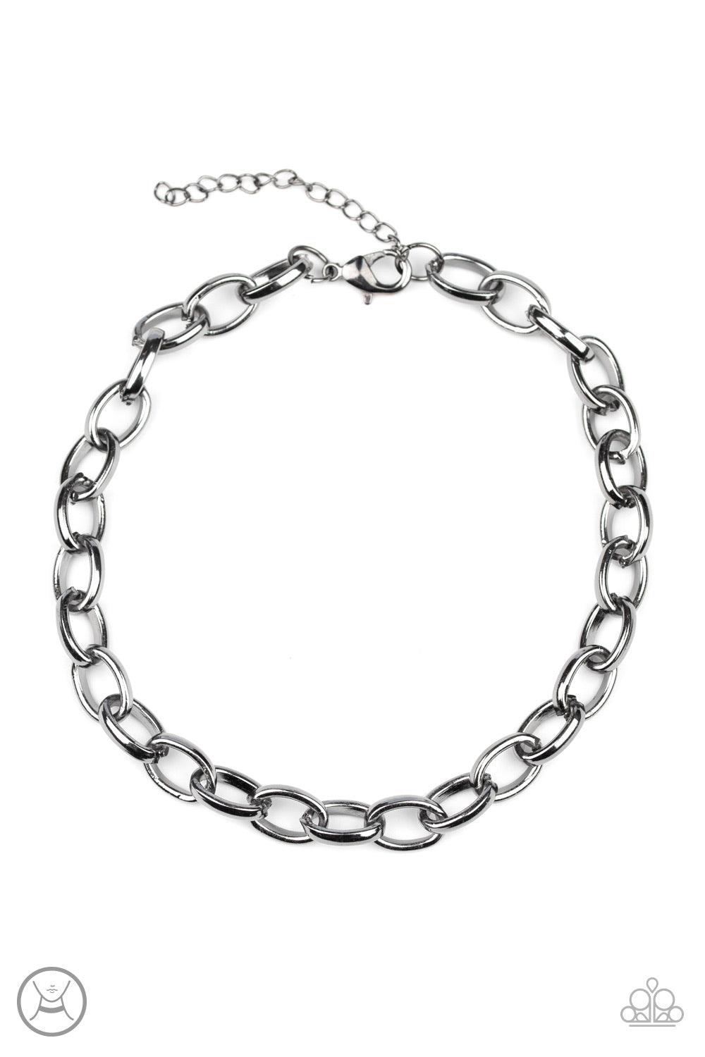 Paparazzi Accessories Urban UpLink - Black Oversized gunmetal links connect below the collar for a bold urban look. Features an adjustable clasp closure. Jewelry