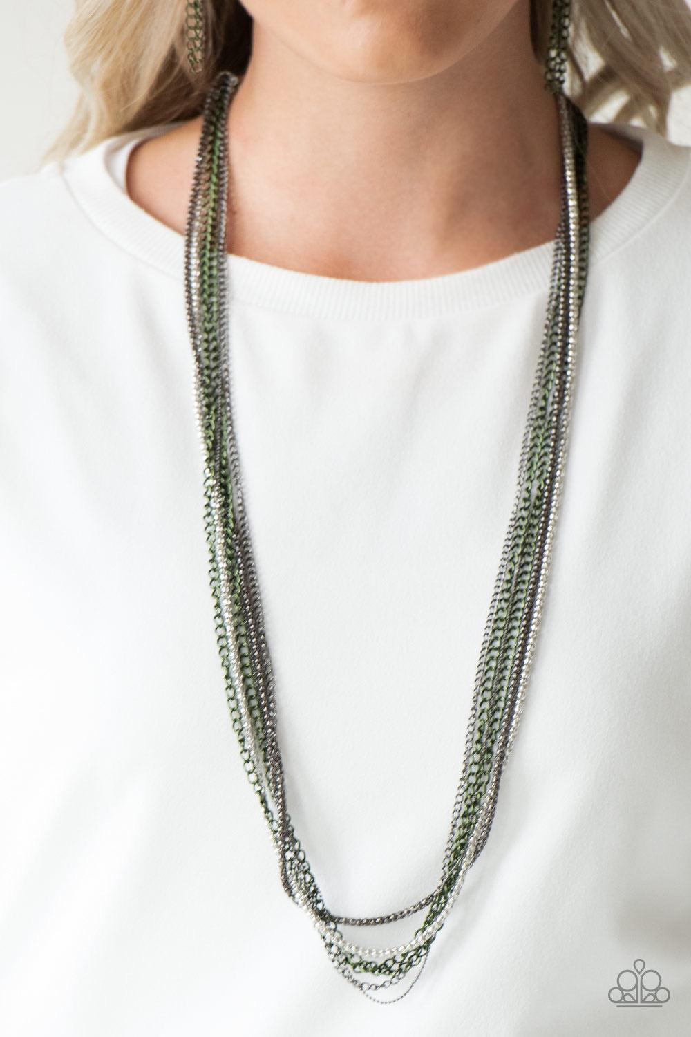 Paparazzi Accessories Colorful Calamity - Green Brushed in a metallic finish, green chains collide with mismatched gunmetal and silver chains across the chest. Shimmery silver and gunmetal popcorn chains join the colorful layers, adding shimmery metallic