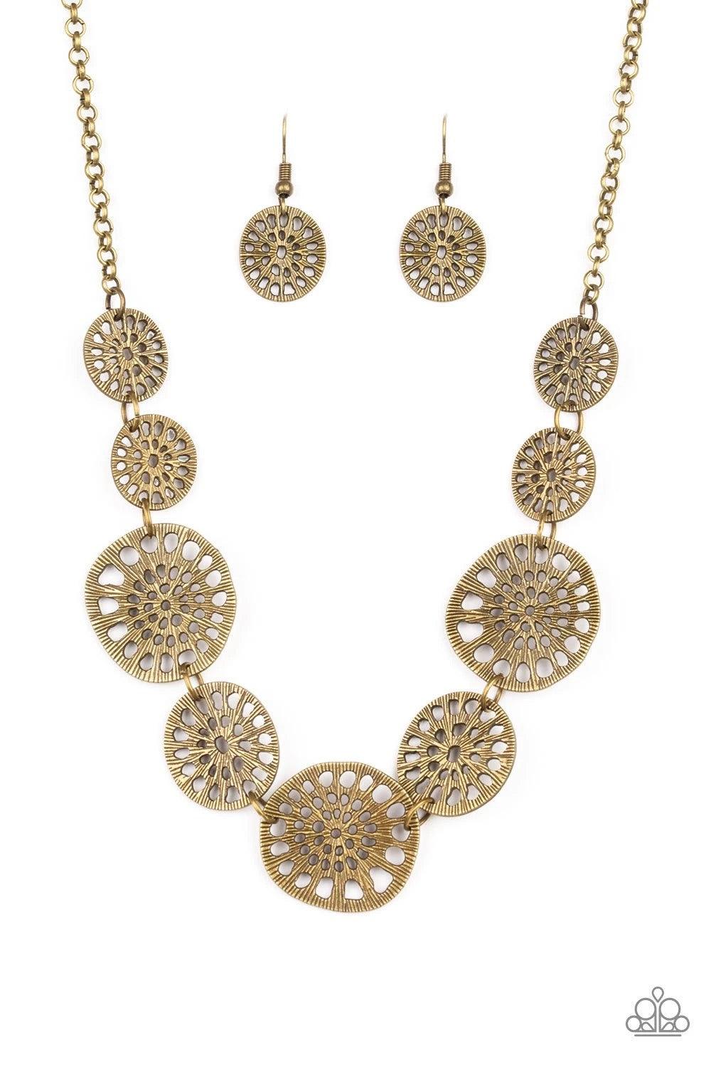 Paparazzi Accessories Your Own Free WHEEL - Brass Featuring airy stenciled patterns, shimmery brass discs link below the collar for a whimsical asymmetrical look. Features an adjustable clasp closure. Jewelry