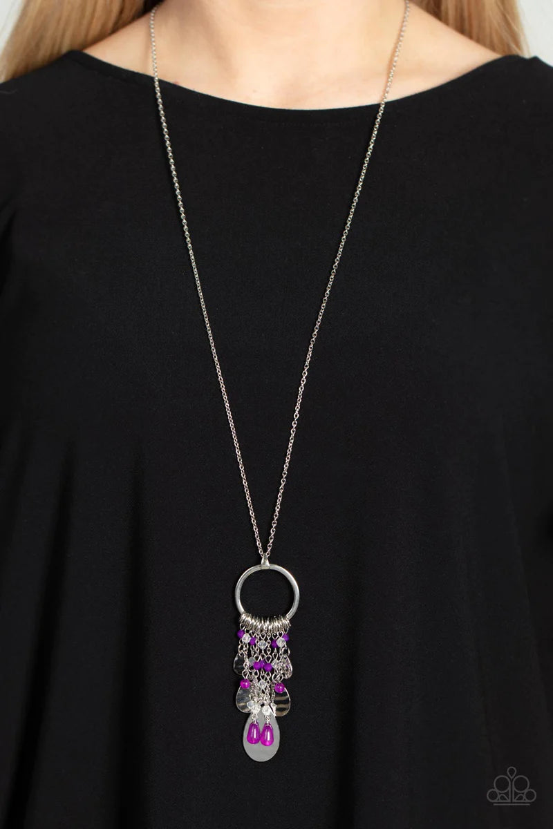 Paparazzi Accessories Totally Trolling - Purple Separated by dainty silver rings, crystal-like beads in the shade of Dahlia stream from the bottom of a flat silver hoop. Gradually increasing in size, hammered silver teardrops add texture and shimmer to th