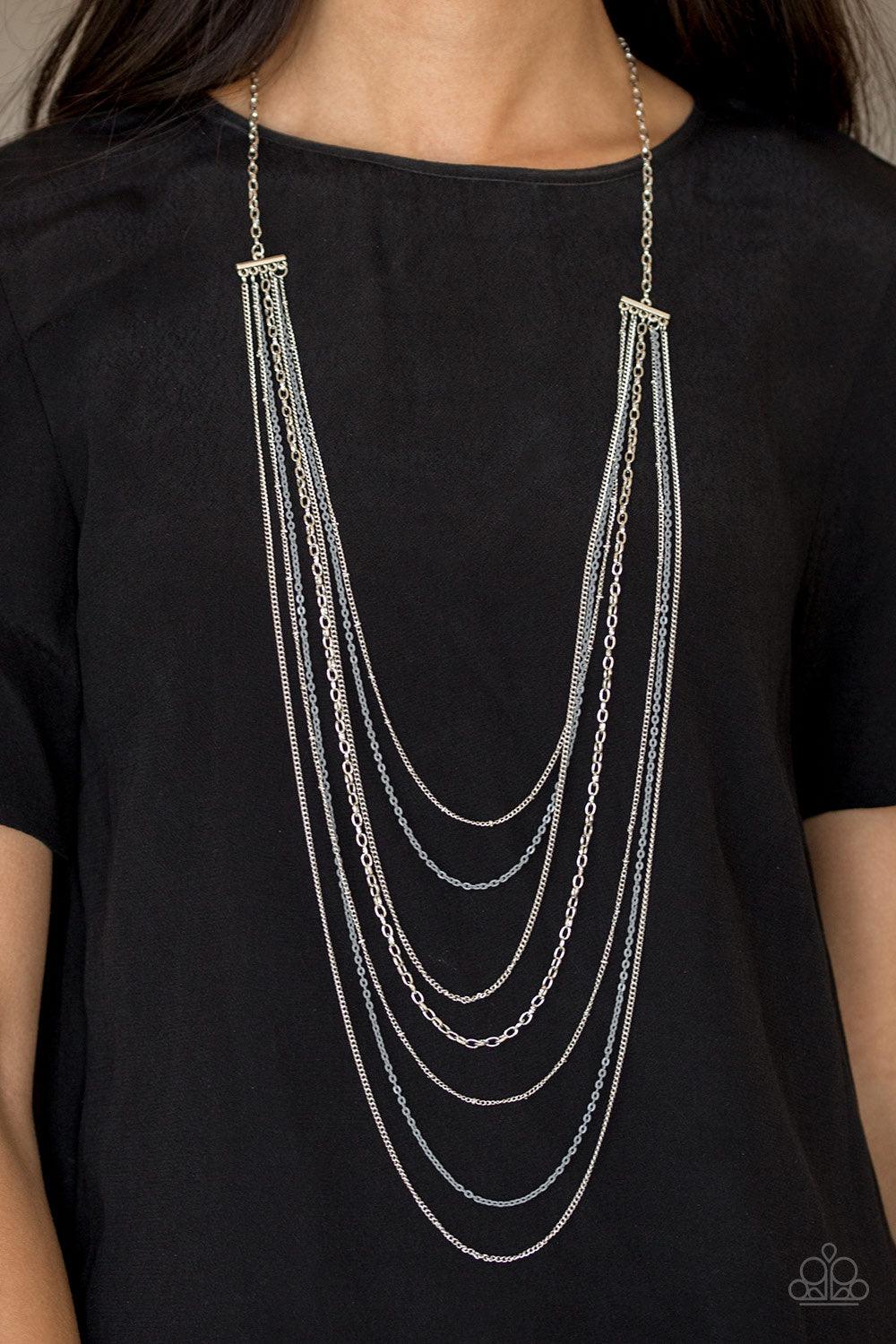Paparazzi Accessories Radical Rainbows - Silver Mismatched silver chains alternate with dainty gray chains down the chest, creating a colorful industrial look. Features an adjustable clasp closure. Sold as one individual necklace. Includes one pair of mat