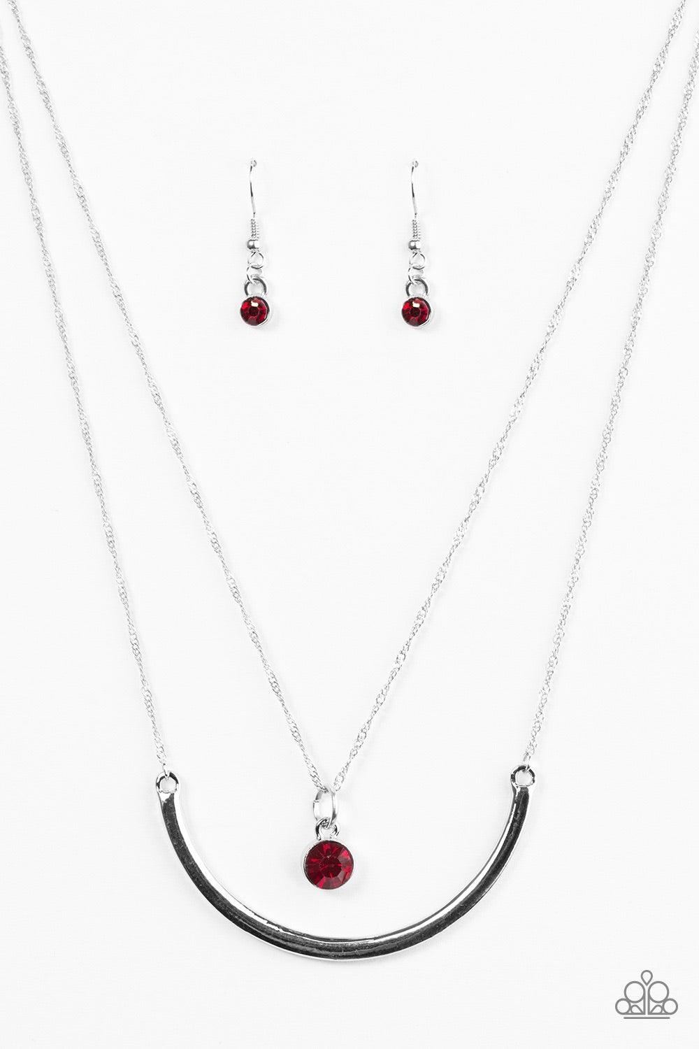 Paparazzi Accessories Moonlit Metro - Red A red gem swings from the uppermost chain above a bowing silver bar. The shimmery layers flawlessly drape below the collar in a refined fashion. Features an adjustable clasp closure. Jewelry