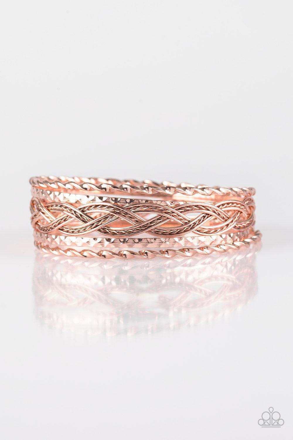 Paparazzi Accessories Straight Street - Rose Gold Featuring smooth and textured finishes, mismatched rose gold bangles glide along the wrist for a causal fashion. Jewelry
