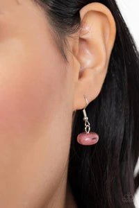 Paparazzi Accessories Oceanside Service - Pink A single silver chain separates two mismatched rows of oversized and cloudy glass-like pink beads. The colorful rows are held in place with textured silver fittings, creating an ethereal pop of color below th