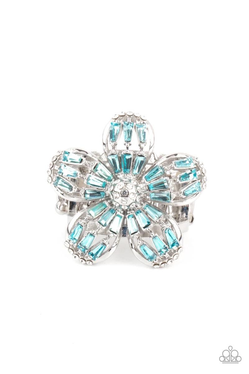 Paparazzi Accessories Botanical Ballroom - Blue Blue emerald-style rhinestones adorn the silver petals of a blooming flower featuring a white rhinestone encrusted beaded center. The tips of the colorful petals are dusted in dainty white rhinestones, addin
