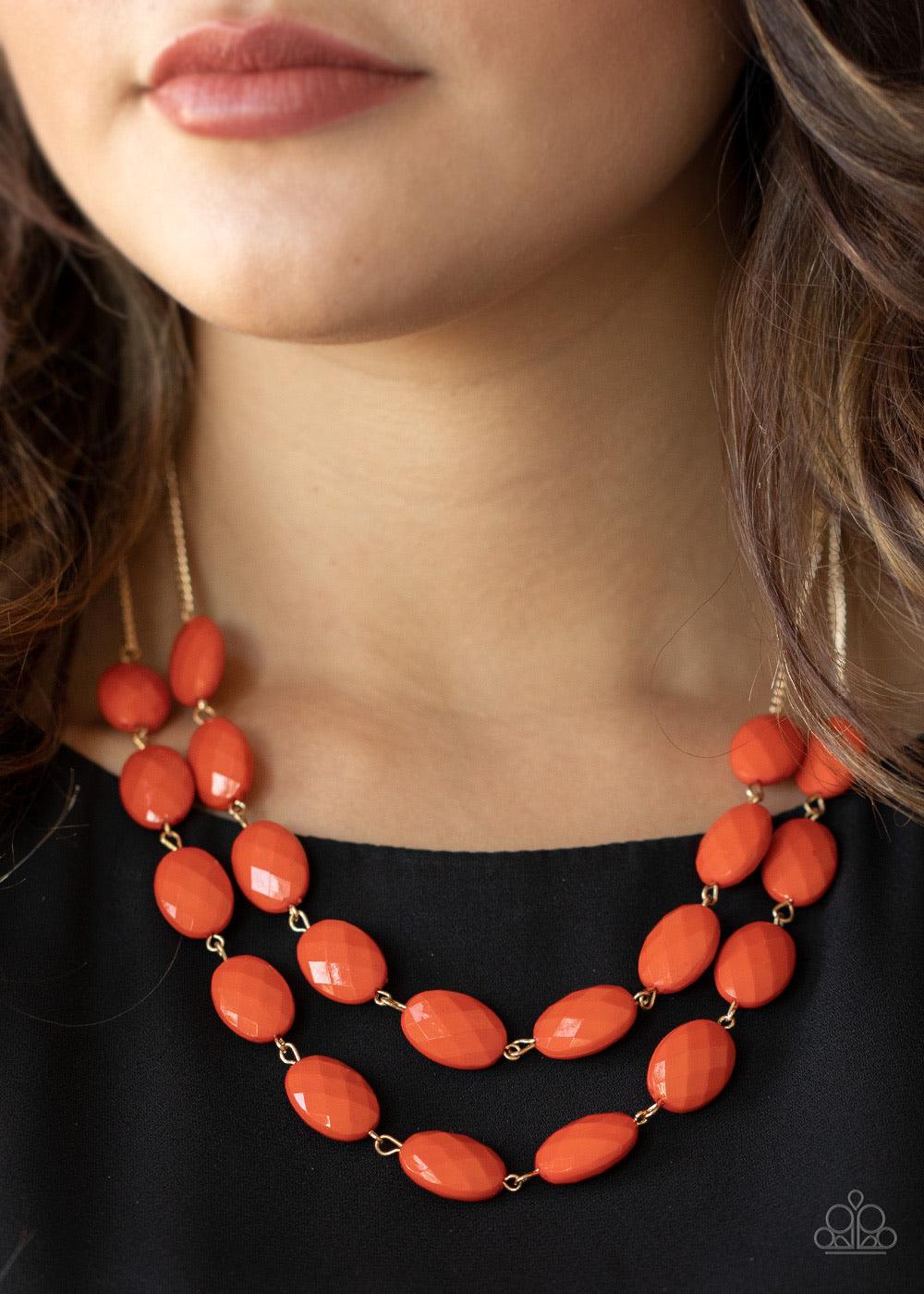 Paparazzi Accessories Max Volume - Orange Attached to dainty gold chains, oval orange beads delicately link into colorful rows below the collar, adding a powerful splash of color to any outfit. Features an adjustable clasp closure. Sold as one individual