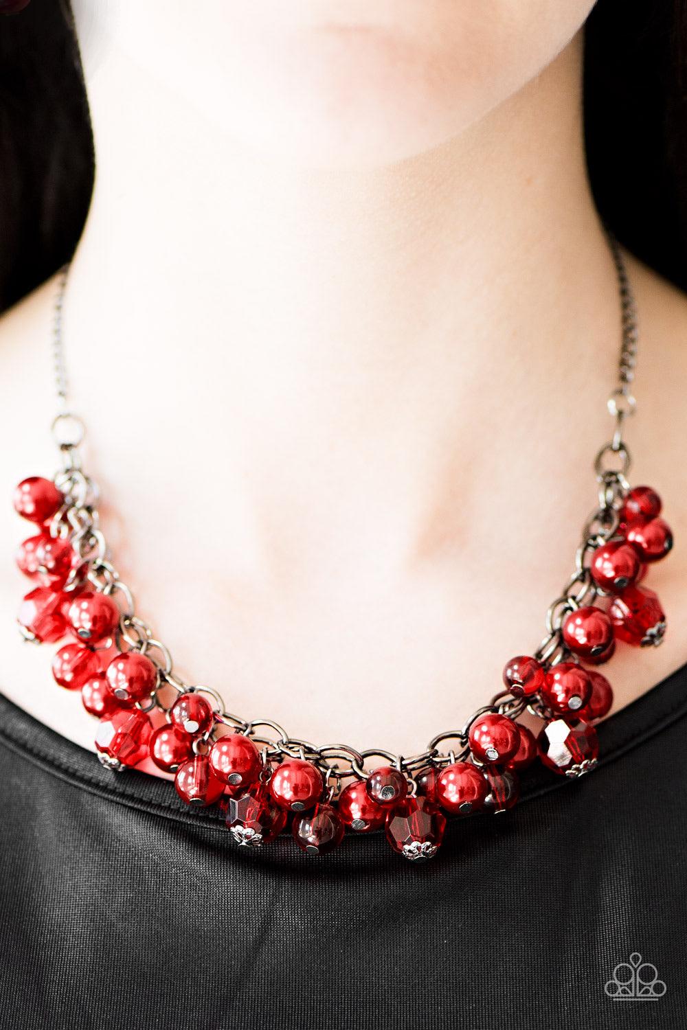 Paparazzi Accessories Time To RUNWAY - Red Glassy, pearly, and faceted crystal-like beading trickle from the bottom of interlocked gunmetal chains, creating a fierce fringe. Features an adjustable clasp closure. Jewelry