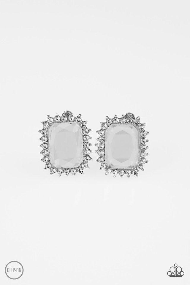 Paparazzi Accessories Insta Famous - White *Clip-On Featuring a regal emerald style cut, a dramatic white gem is pressed into the center of a silver frame radiating with glassy white rhinestones for a show-stopping look. Earring attaches to a standard cli