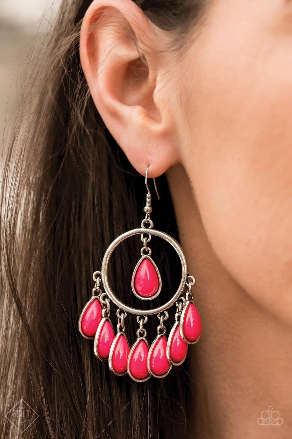 Paparazzi Accessories Flirty Flamboyance ~Pink A fringe of pink beaded teardrops dangles from the bottom of a shiny silver hoop. A solitaire pink teardrop bead is suspended from the top of the hoop for a flirtatious finish. Earring attaches to a standard