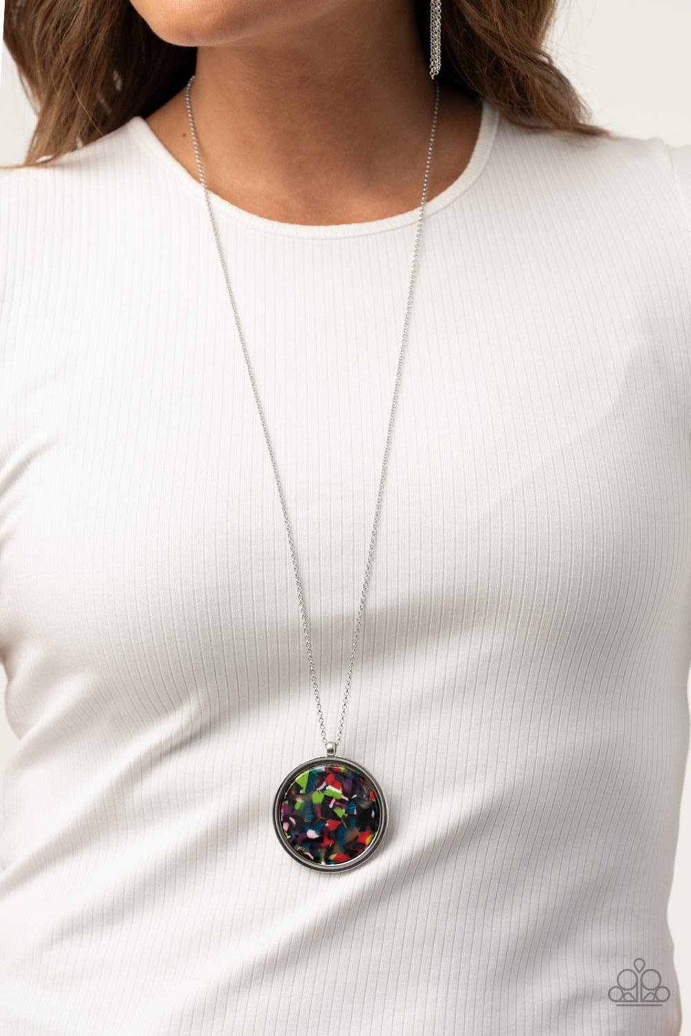 Paparazzi Accessories It’s POP Secret! - Multi Featuring a multicolored tortoise shell pattern, a flat acrylic circle is pressed into a sleek silver ring, creating a colorfully retro pendant at the bottom of a lengthened silver chain. Features an adjustab