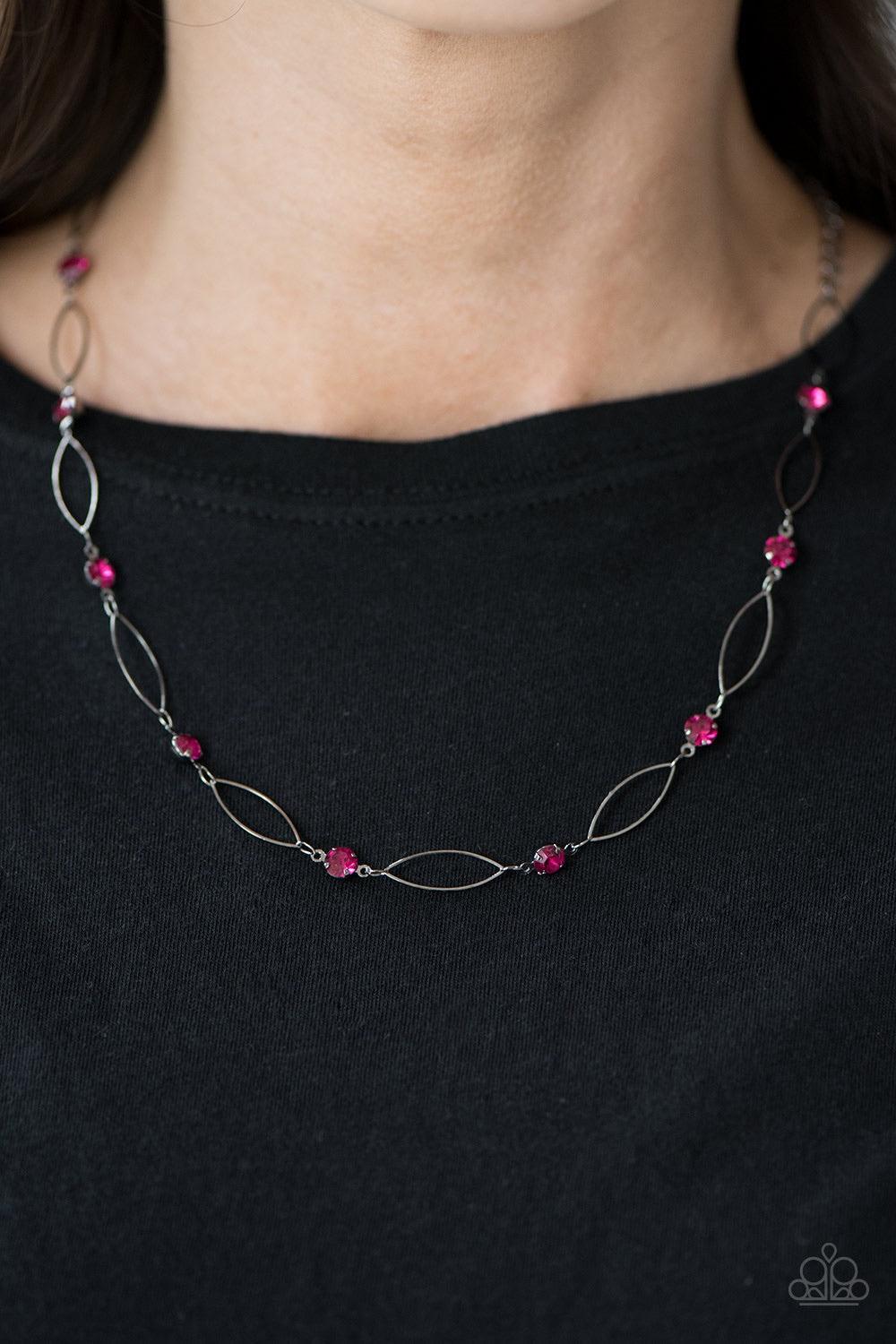 Paparazzi Accessories Time Is Of The Essence - Pink Shimmery gunmetal marquise-shaped frames delicately link with glittery pink rhinestones below the collar, creating a timeless palette. Features an adjustable clasp closure. Jewelry
