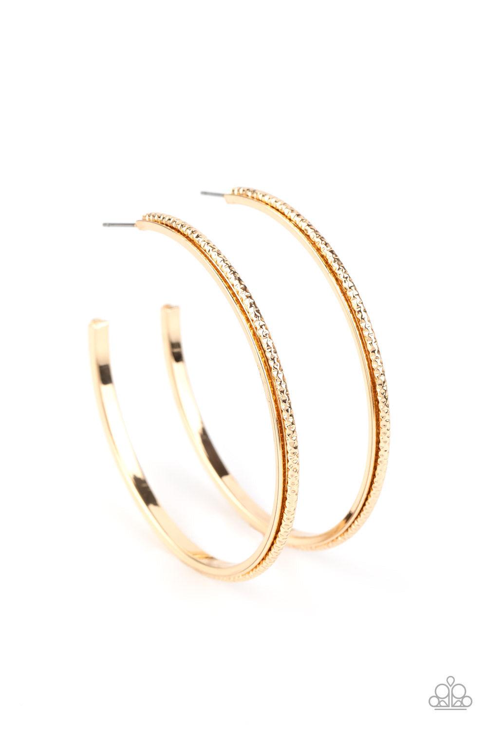Paparazzi Accessories Sultry Shimmer - Gold Featuring shimmery diamond-cut texture, a glistening gold bar lines the center of a beveled gold hoop, creating an edgy stacked look. Earring attaches to a standard post fitting. Hoop measures approximately 2 1/
