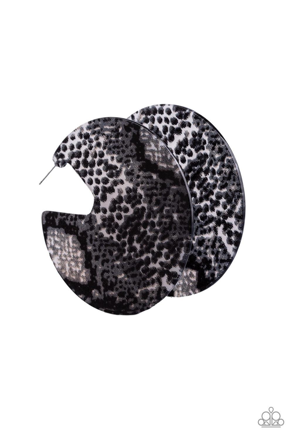 Paparazzi Accessories Hit or HISS - Black Featuring a python pattern, an abstract acrylic hoop curls around the ear for a retro look. Earring attaches to a standard post fitting. Hoop measures approximately 2 3/4" in diameter. Jewelry