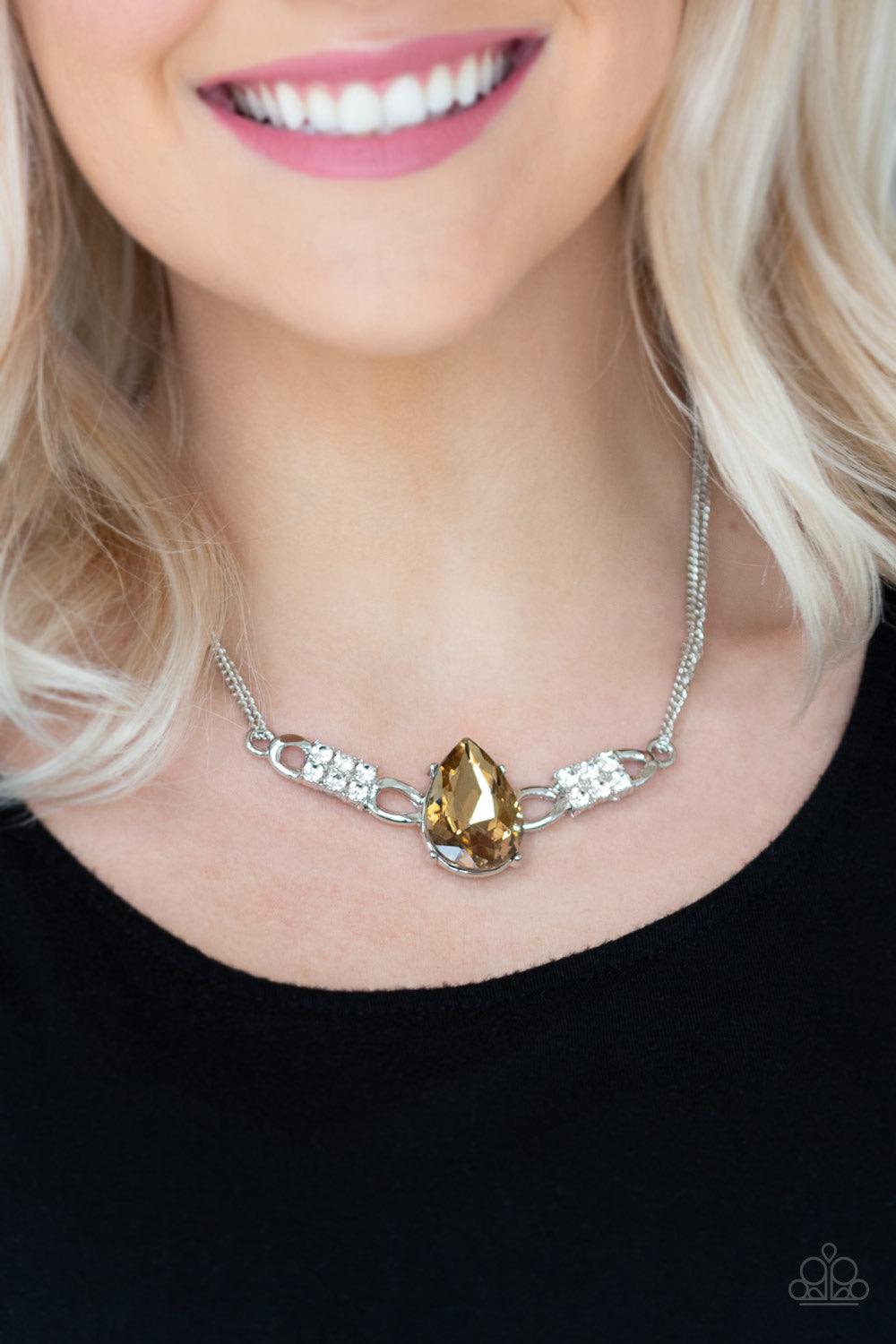 Paparazzi Accessories Way To Make An Entrance - Brown Brushed in an antiqued shimmer, a collision of glistening copper bars and hammered copper accents coalesce into an abstract statement piece below the collar for a fierce industrial look. Features an ad