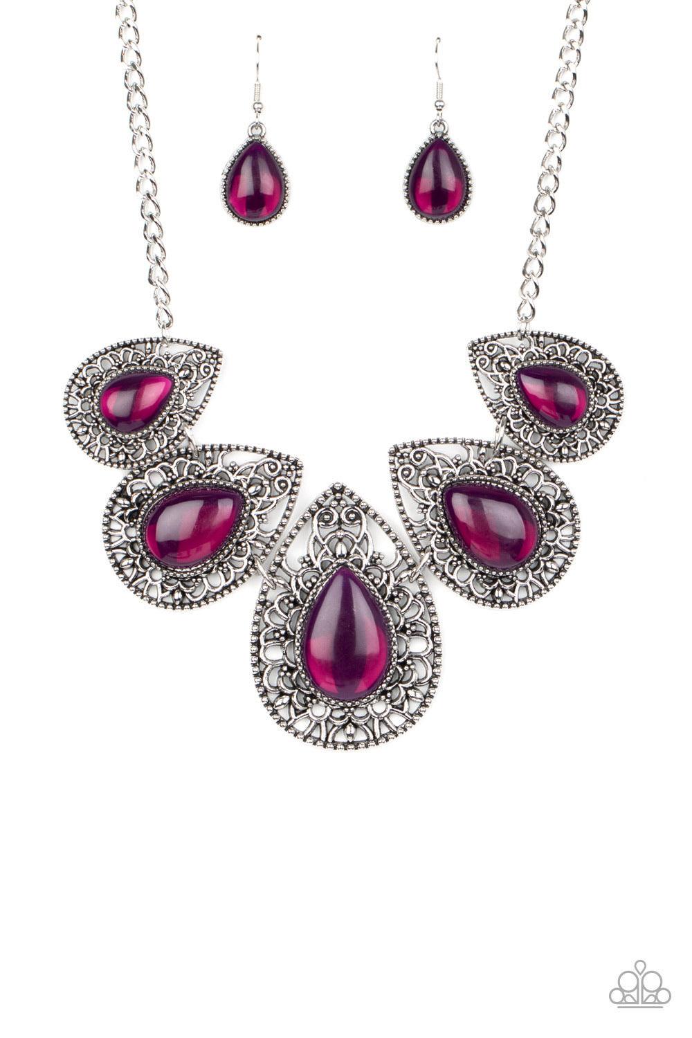 Paparazzi Accessories Opal Auras Featuring an opalescent shimmer, glassy purple teardrop beads are nestled inside shiny silver frames filled with vine-like antiqued filigree. Graduating in size, the whimsical frames delicately link below the collar for an
