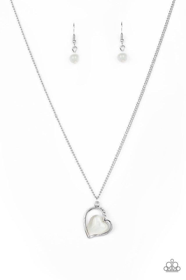 Paparazzi Accessories Love of My Life - White Chiseled into a tranquil heart, a white moonstone is pressed into the center of an airy silver heart frame radiating with sections of glittery white rhinestones for a romantic finish. Features an adjustable cl