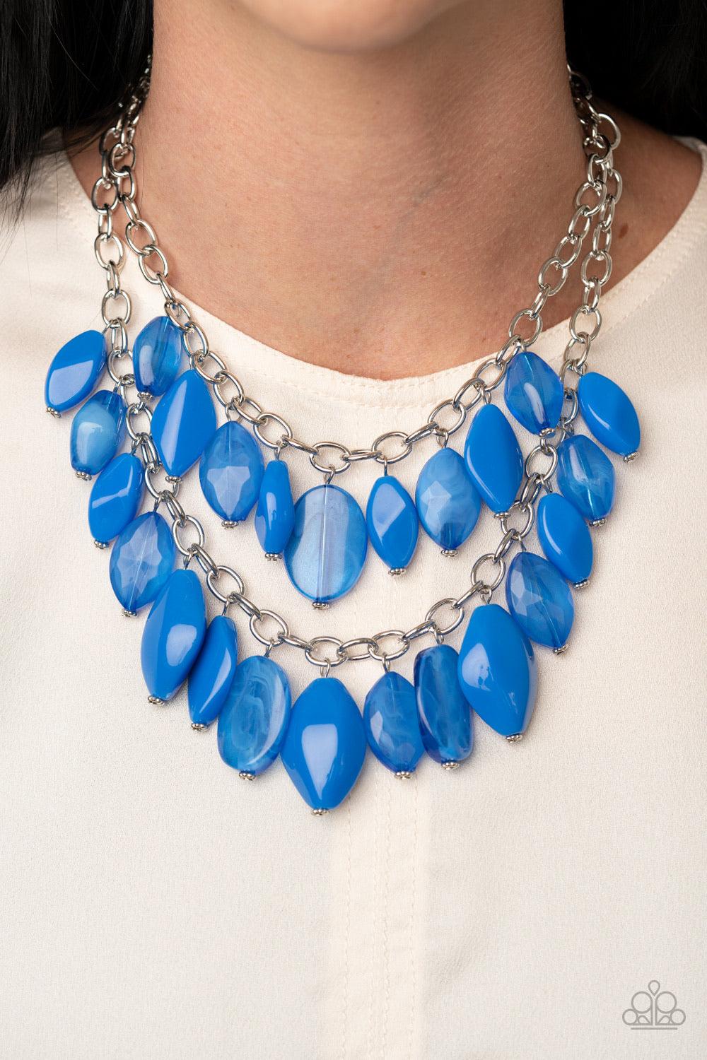 Paparazzi Accessories Palm Beach Beauty - Blue Two boisterous rows of glassy, opaque, and faceted blue beads boldly layer below the collar for a vivaciously colorful look. Features an adjustable clasp closure. Sold as one individual necklace. Includes one