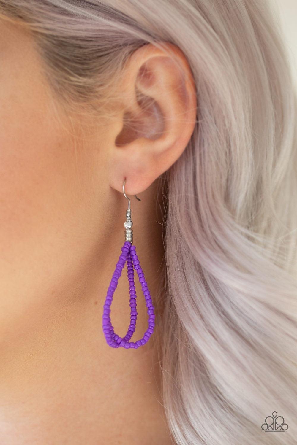 Paparazzi Accessories A Standing Ovation - Purple Countless strands of vivacious purple seed beads are twisted and knotted together to create an unforgettable statement piece. Features an adjustable clasp closure. Jewelry