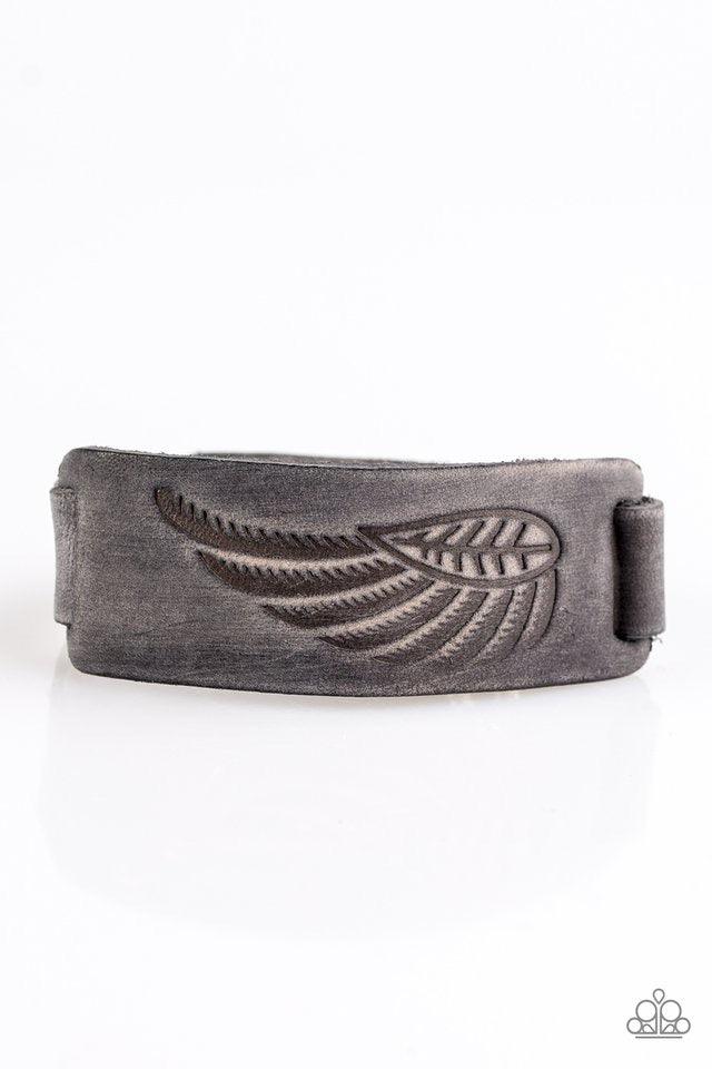 Paparazzi Accessories Backwoods Roamer - Silver Brushed in a distressed finish, a gray suede band is stamped in an earthy leaf and feather pattern for a seasonal look. Features an adjustable snap closure. Jewelry