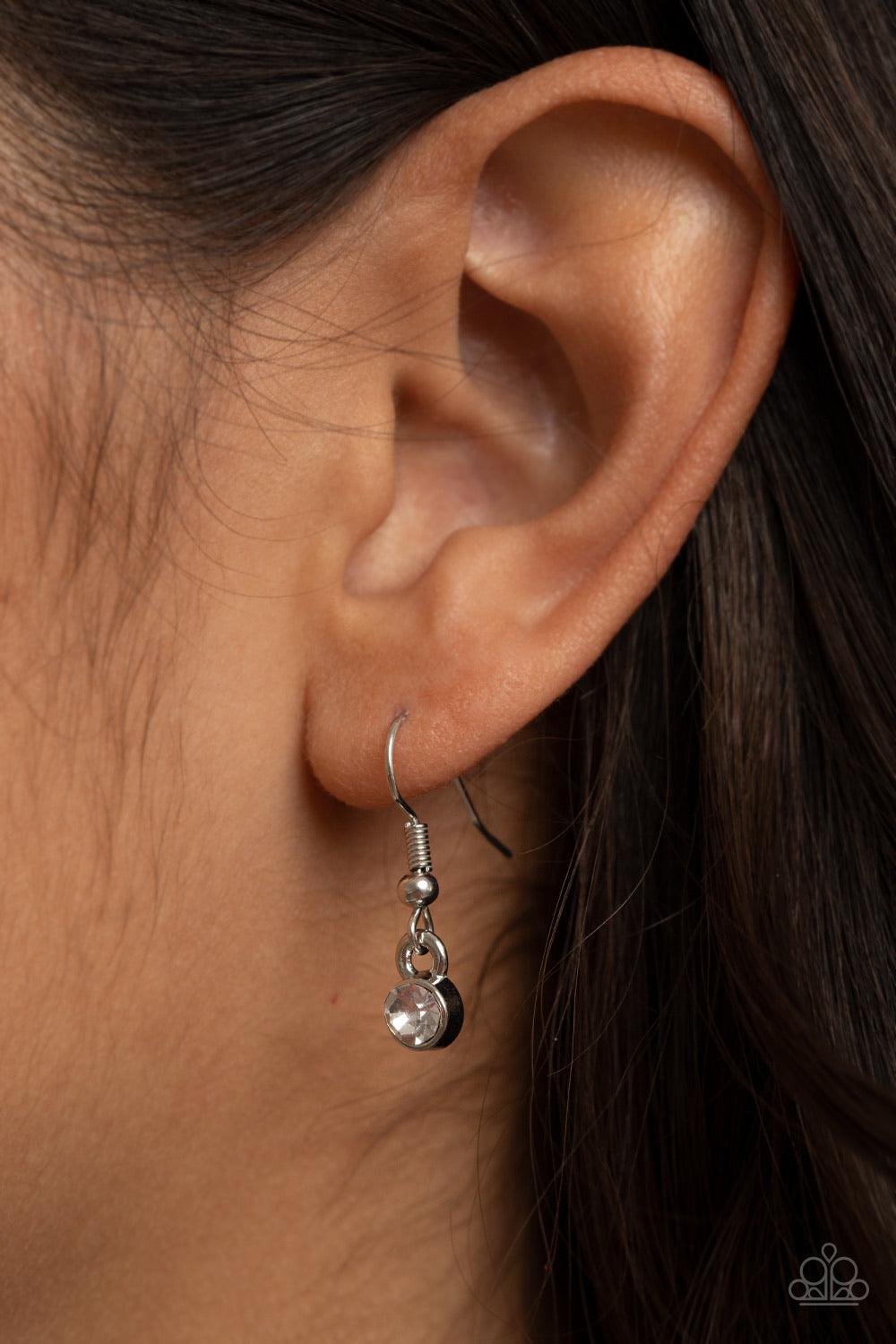 Paparazzi Accessories Crystal Cosmos - Green Pairs of glittery white rhinestones, join a sparkly collection of round, square, and dewy teardrop green rhinestones below the collar for a timeless look. Features an adjustable clasp closure. Sold as one indiv