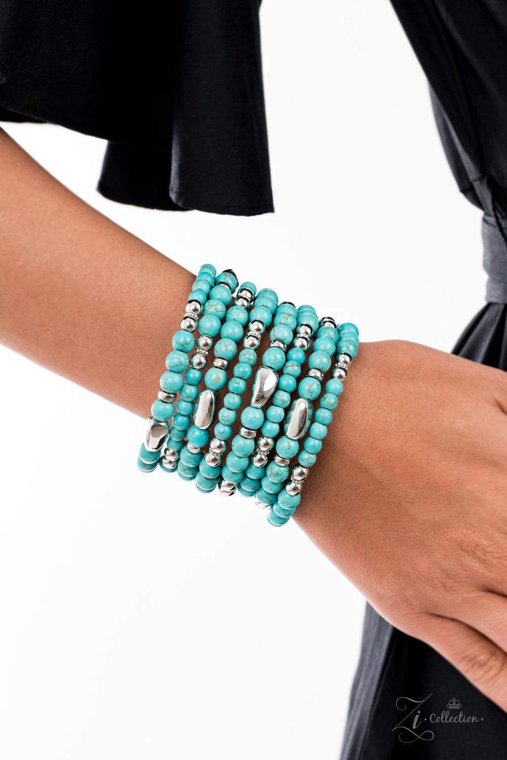 Paparazzi Accessories Party Crusher: ZiCollection An artisanal assortment of mismatched turquoise stones and silver accents are threaded along a dainty wire that infinitely coils around the wrist, creating glamorously groundbreaking layers. Sold as one in