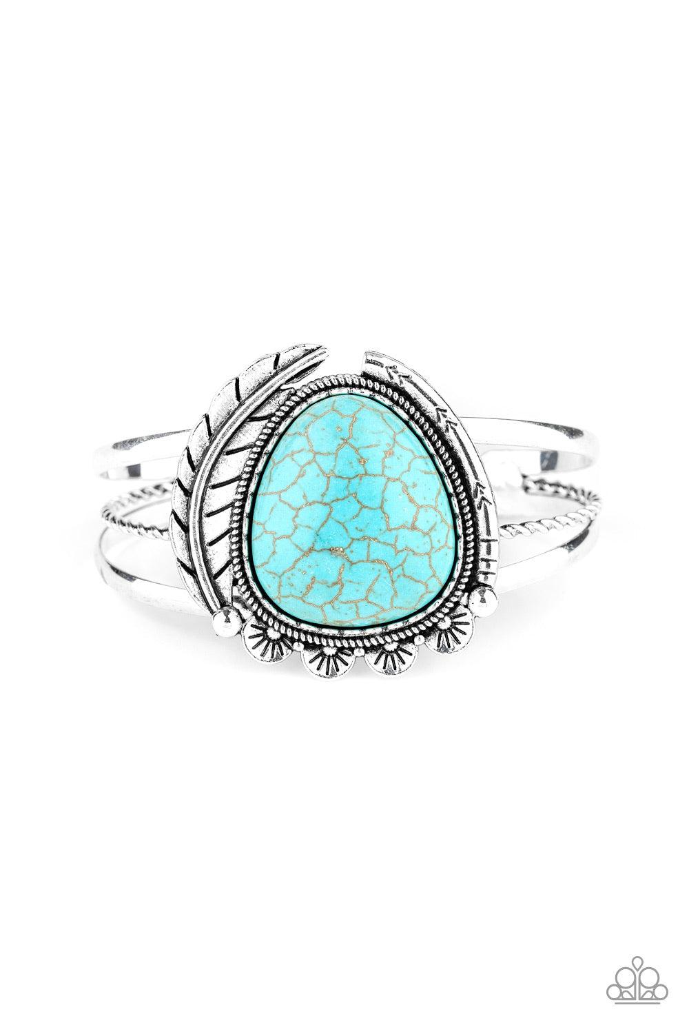 Paparazzi Accessories Natures Bounty - Blue Chiseled into a tranquil teardrop shape, a refreshing turquoise stone is pressed into the center of a layered silver cuff. Stamped in tribal inspired patterns, mismatched silver frames and an antiqued silver fea