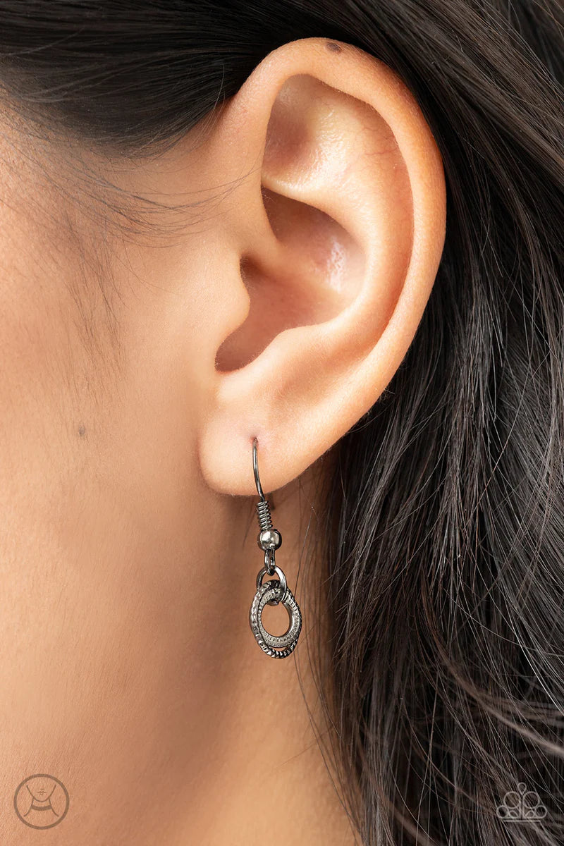 Paparazzi Accessories Grit And Grind - Black Dainty pairs of textured gunmetal hoops and rings link with pinched gunmetal fittings around the neck, resulting in a gritty vibe. Features an adjustable clasp closure. Sold as one individual choker necklace. I