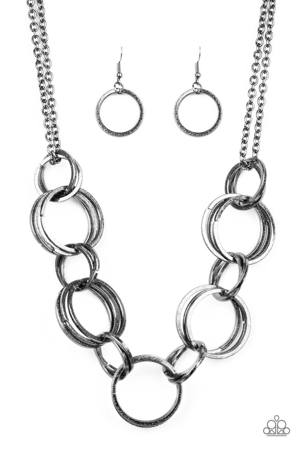 Paparazzi Accessories Jump Into the Ring - Black Brushed in an antiqued shimmer, doubled and tripled gunmetal hoops link below the collar for a bold industrial look. Features an adjustable clasp closure. Jewelry