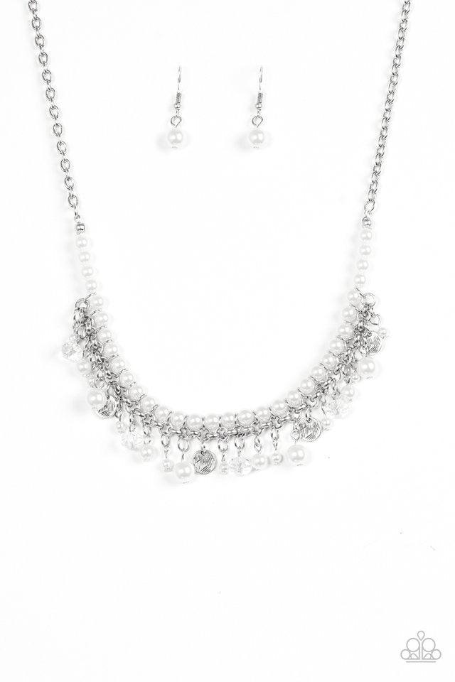 Paparazzi Accessories Glamour Trove - White Swinging from the bottom of a shimmery silver chain, classic white pearls are threaded along an invisible wire, creating a refined look below the collar. Etched in glistening textures, shimmery silver discs, pea