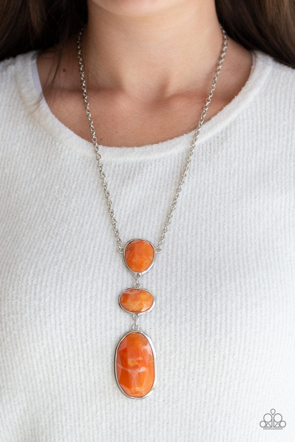 Paparazzi Accessories Making An Impact - Orange Featuring a colorful marble-like finish, three mismatched Orange Tiger acrylic frames link down the chest for a dramatic effect. Features an adjustable clasp closure. Color may vary. Jewelry