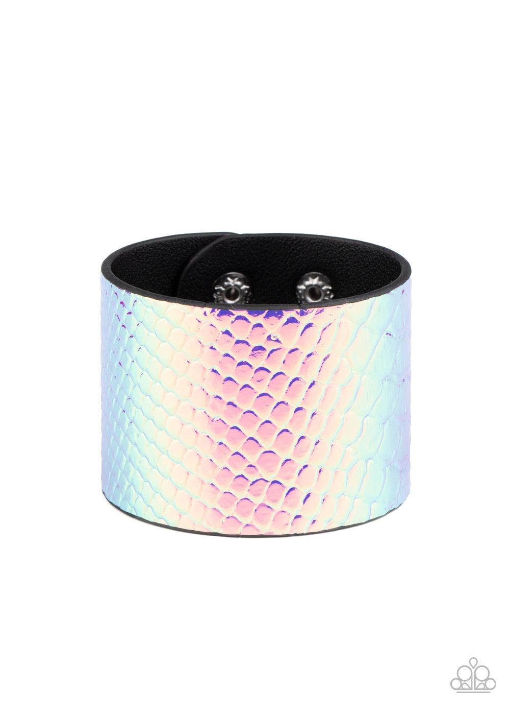 Paparazzi Accessories Galactic Galapagos - Pink Featuring an iridescent crocodile pattern, a metallic pink leather band wraps around the wrist for a retro look. Features an adjustable snap closure. Sold as one individual bracelet. Jewelry