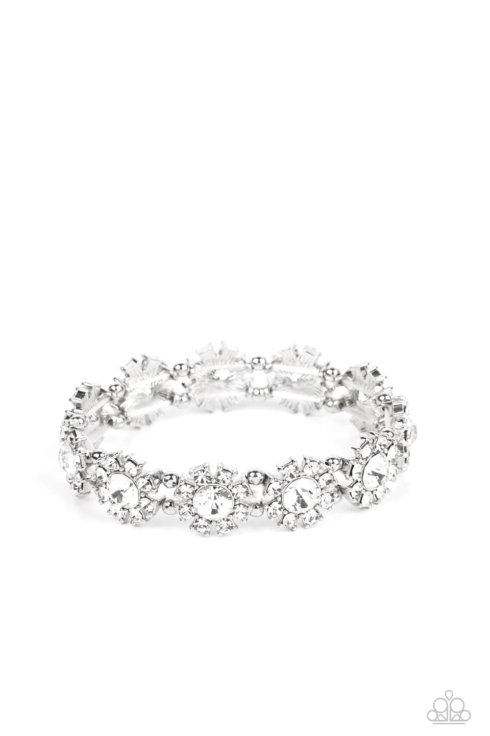 Paparazzi Accessories Premium Perennial - White Separated by pairs of dainty silver beads, rhinestone-dotted petals bloom from oversized white rhinestone centers along stretchy bands around the wrist for a flirtatious floral fashion. Sold as one individua