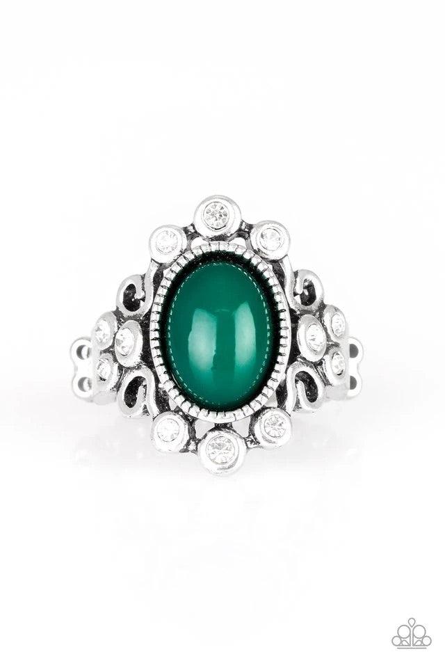 Paparazzi Accessories Noticeable Notable - Green A polished green bead is pressed into a bubbly silver frame radiating with glassy white rhinestones for a notable finish. Features a stretchy band for a flexible fit. This hunter green ring is perfect for t
