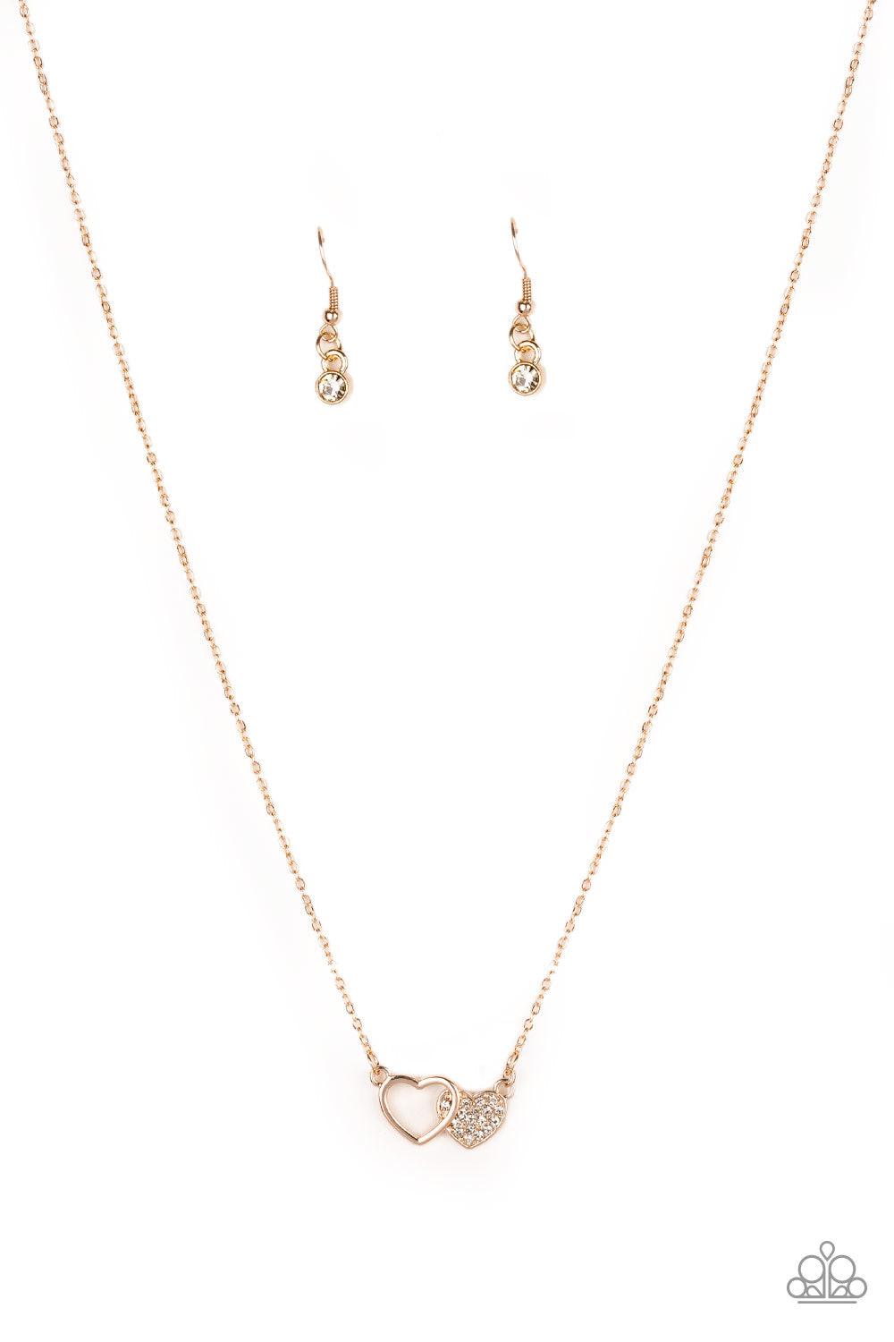 Paparazzi Accessories Charming Couple - Rose Gold A white rhinestone encrusted rose gold heart joins a glistening rose gold heart silhouette at the bottom of a shimmery rose gold chain, creating a charming pendant below the collar. Features an adjustable