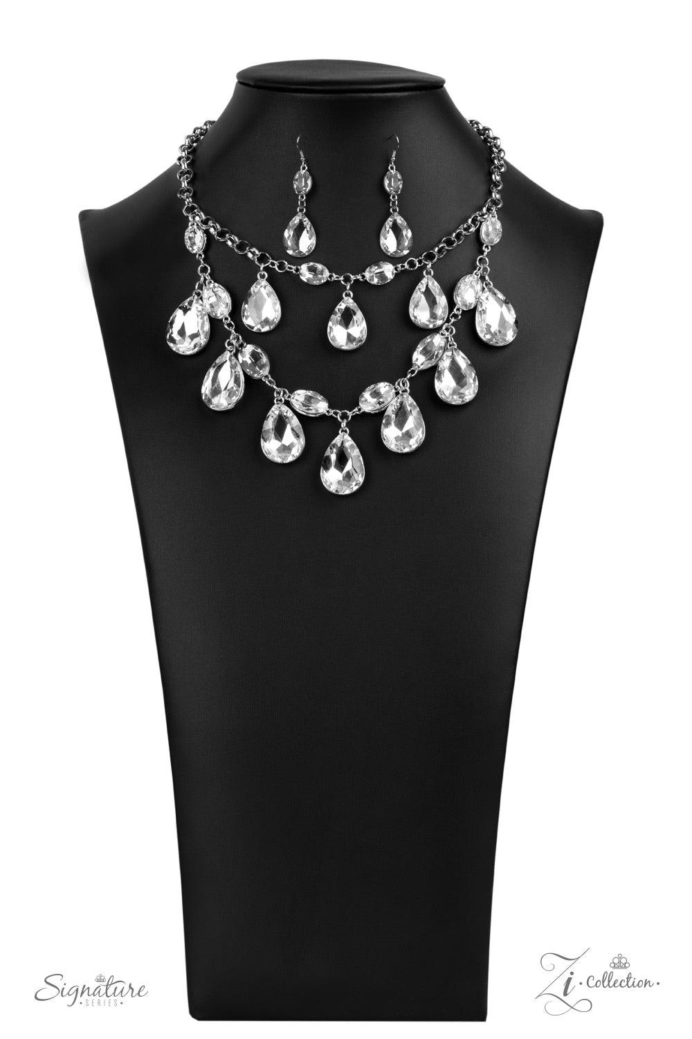 Paparazzi Accessories The Sarah 💗💗ZiCollection $25💗💗 Tiers of oversized white teardrop gems demand attention as they drip from two blinding rows of elegantly linked white oval rhinestones. Infused with sections of chunky silver chain links, the sparkl