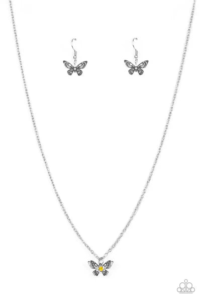 Paparazzi Accessories Flutter Love - Yellow Layered with ornate silver wings, a yellow rhinestone dotted butterfly flutters from a dainty silver chain below the collar for a whimsical fashion. Features an adjustable clasp closure. Sold as one individual n