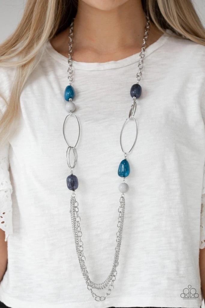 Paparazzi Accessories Pleasant Promenade - Multi Featuring polished and cloudy faux rock finishes, gray and blue beads link with bold silver hoops. The whimsical compilation gives way to layers of mismatched silver chains for a seasonal finish. Features a